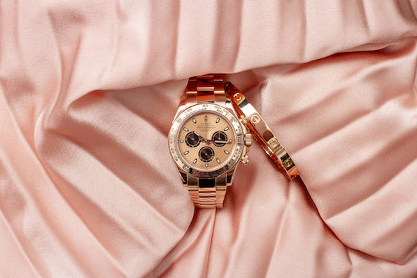Rolex watch and Cartier Love bracelet