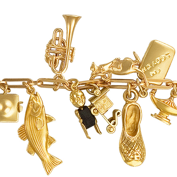 Assorted charm bracelet in 14k yellow gold. Length 7.5 inches. image 4
