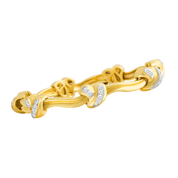  "Kisses" diamond bangle bracelet in 18k yellow gold. Round brilliant cut diamonds total approx. weigth: 1.45 carat, image 1