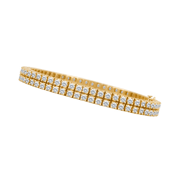 Double row diamond tennis bracelet in 14k yellow gold w/ approx. 6 carats in round diamonds. image 1