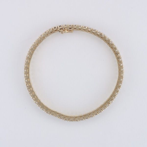 Double row diamond tennis bracelet in 14k yellow gold w/ approx. 6 carats in round diamonds. image 3