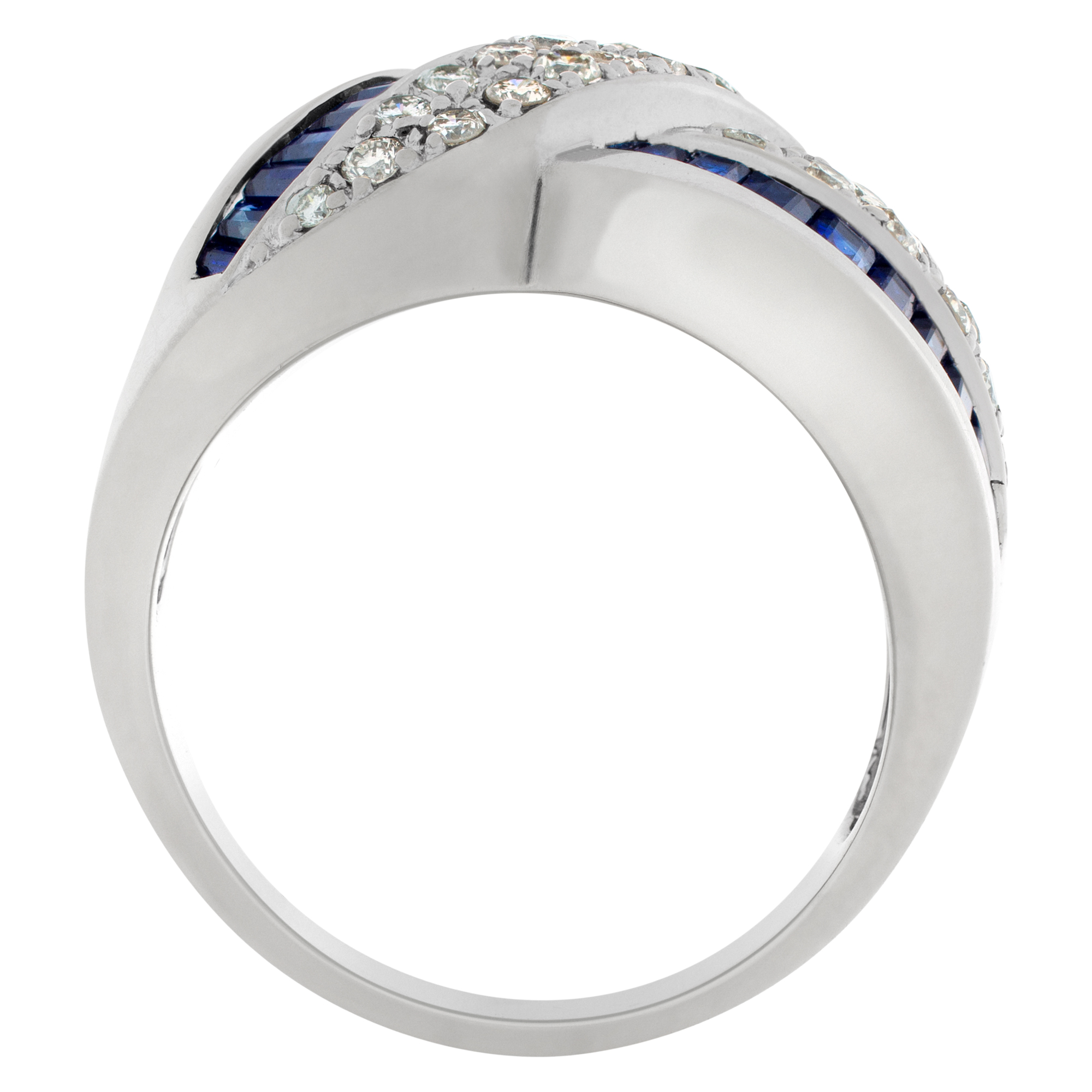 Criss-Cross sapphire & diamond ring in 14K white gold. Approx 1 carat tapered emerald cut sapphire and 0.75 carat full cut round diamond. image 5