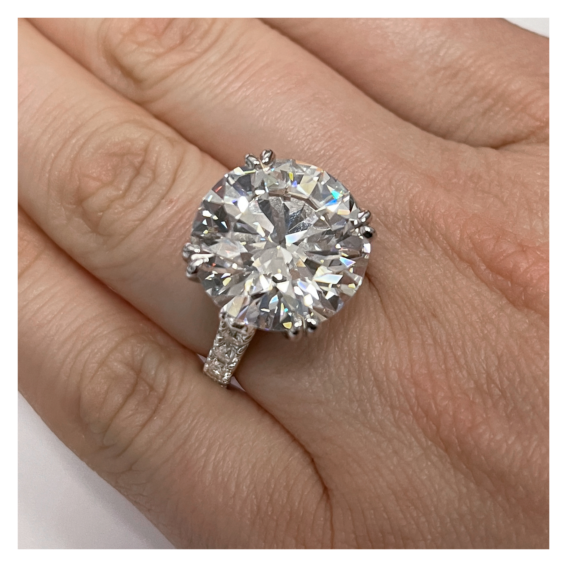 GIA Certified 16.92 carats round brilliant cut diamond set in 18K diamonds white gold ring. I color, image 3