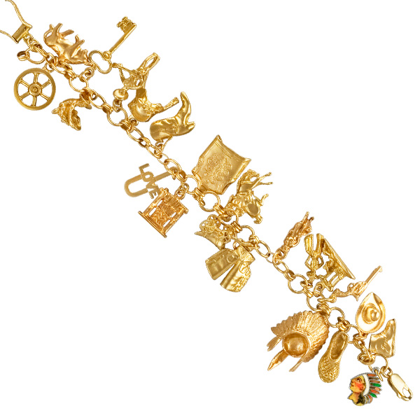 Assorted charm bracelet in mostly 14k (some are in 10k) with fish, shoe, key, etc.