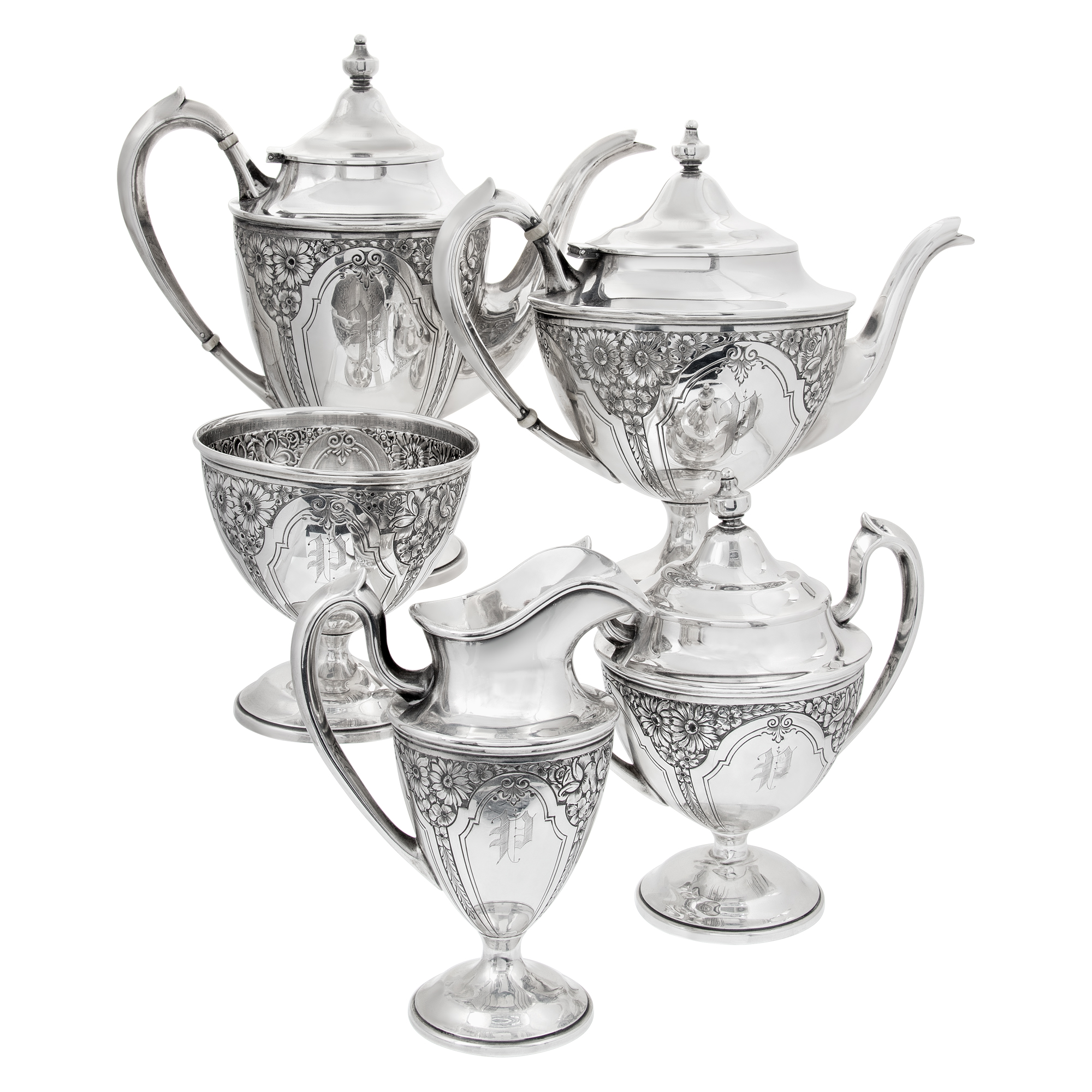 Sterling Silver 5 pieces tea/coffee set with Repousse flowers decor.