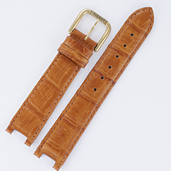 Tissot brown leather strap 18x16 with tang buckle.