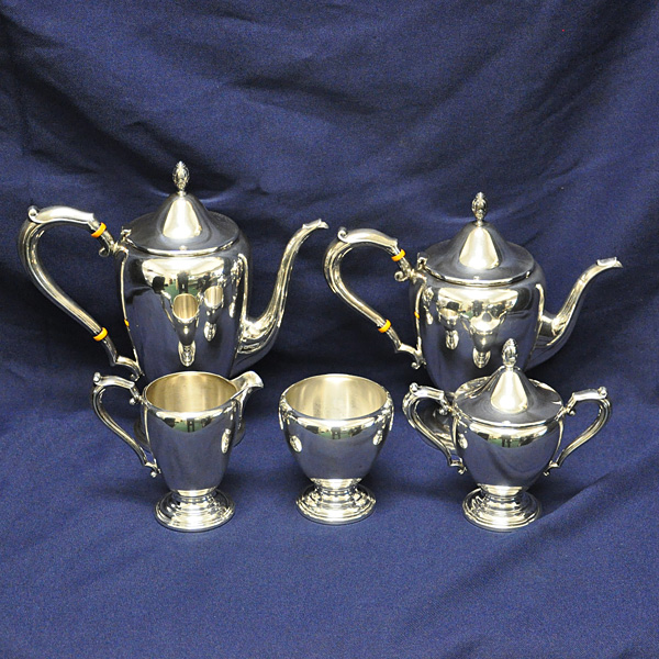 ADAMS, Frank M. Whithing, 5 pieces tea and coffee sterling silver set, patentd in 1944, approx. 55 ounces troy of .925 sterling silver set
