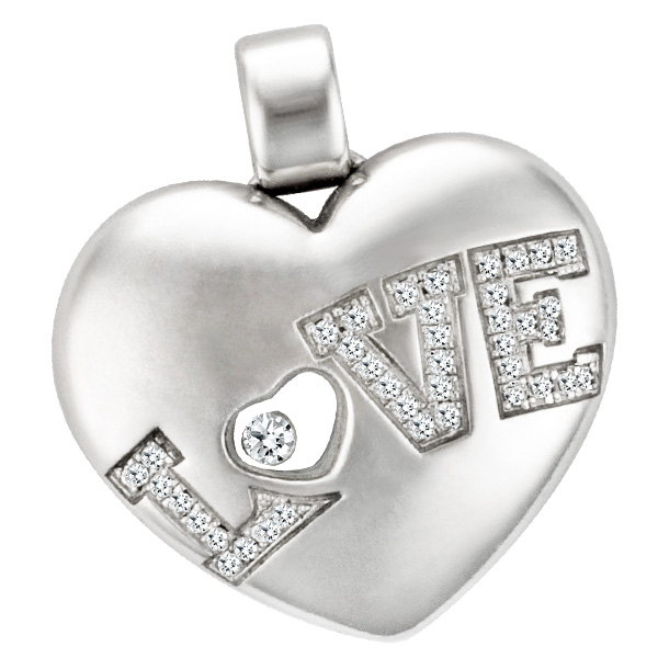 Chopard diamond heart pendant in 18k white gold with 1 floating diamond