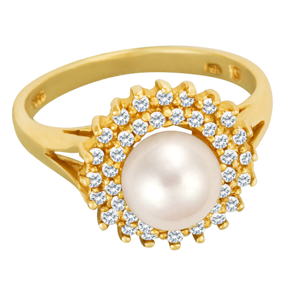 Magnificent Pearl ring in 14k surrounded by 2 rows of diamonds