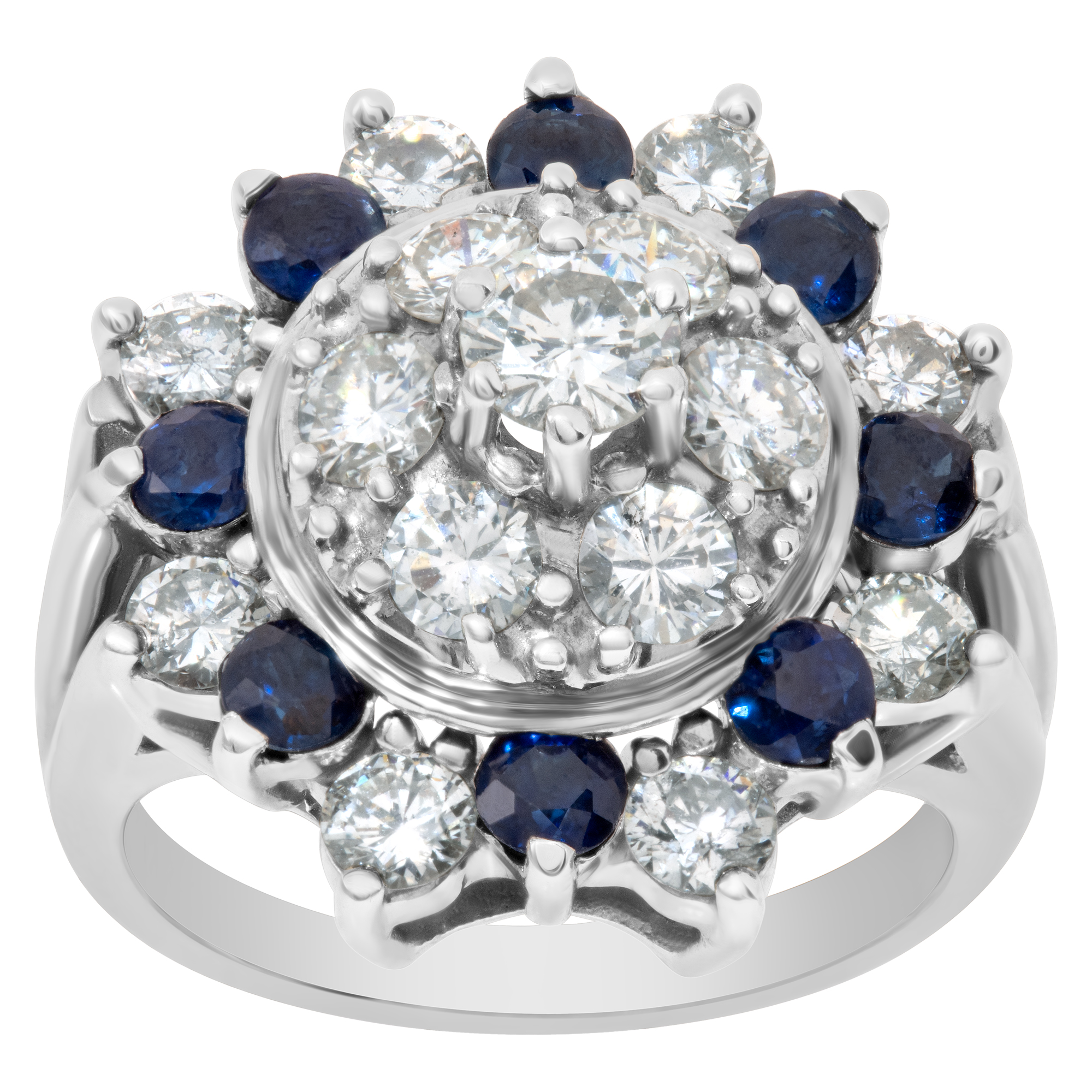 Vintage diamonds and sapphire ring set in 14K white gold. Round brilliant cut diamonds total approx weight over 2.00 carats.