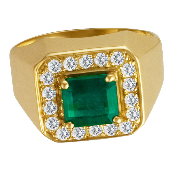 Ladies 18k yellow gold Emerald Ring encased with Diamonds. App 1.2 ct emerald and 0.50 cts diamonds