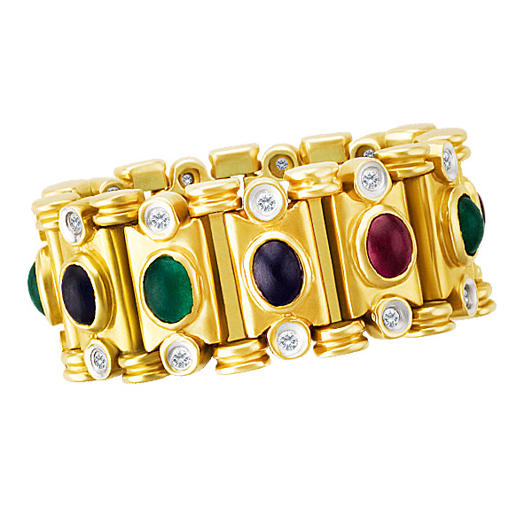 Flexible ring in 14k yellow gold w/ round diamonds & cabochon emeralds, sapphires & rubies