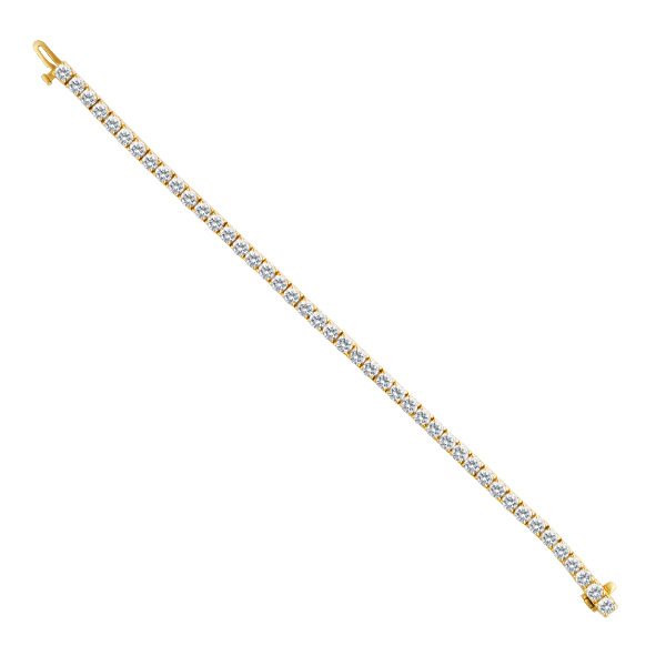 Diamond line bracelet in 14k yellow gold.