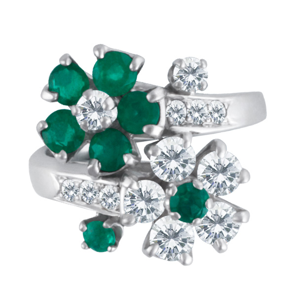 Emerald & diamond flower ring set in platinum. Size 2