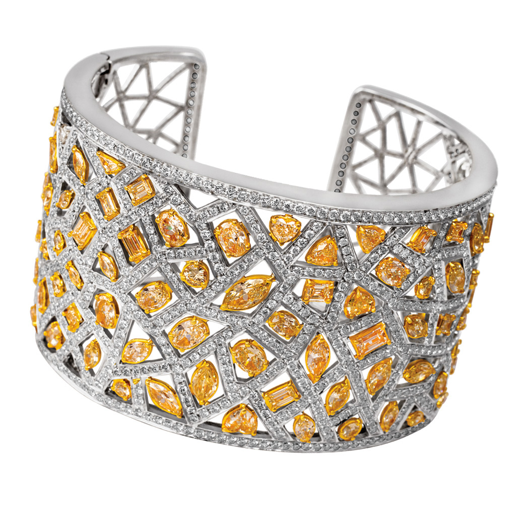 White and yellow diamond cuff in 18k white gold