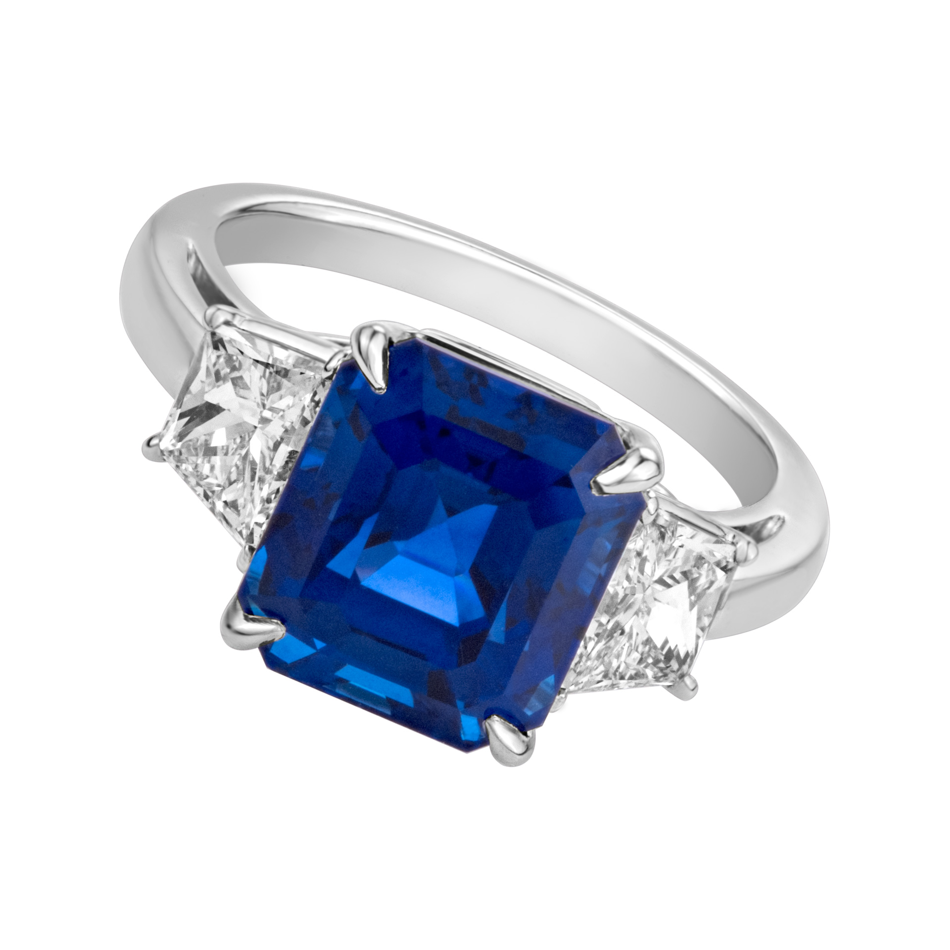 Certified Emerald cut sapphire and diamond ring set in Platinum