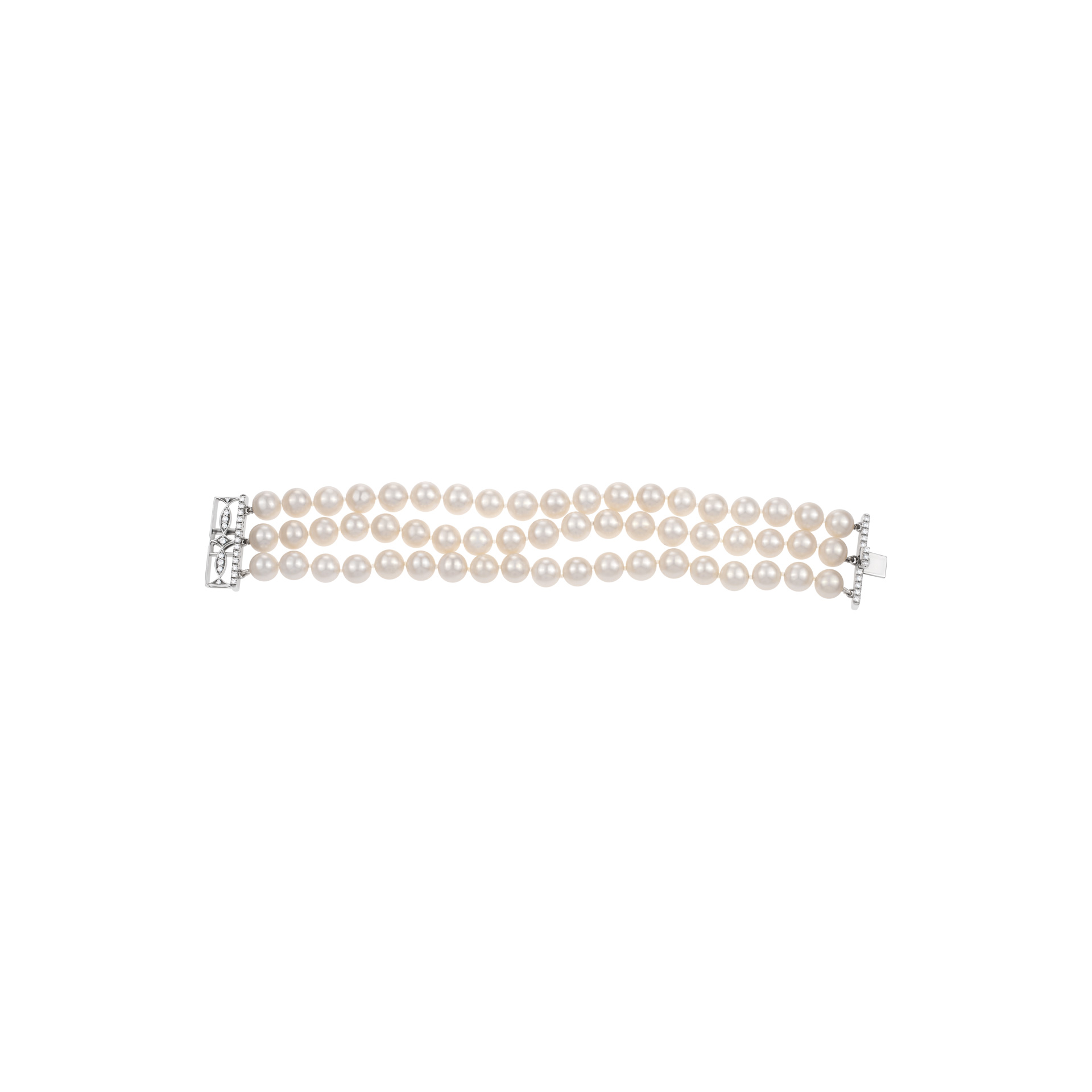 Three strand pearl bracelet with diamond buckle