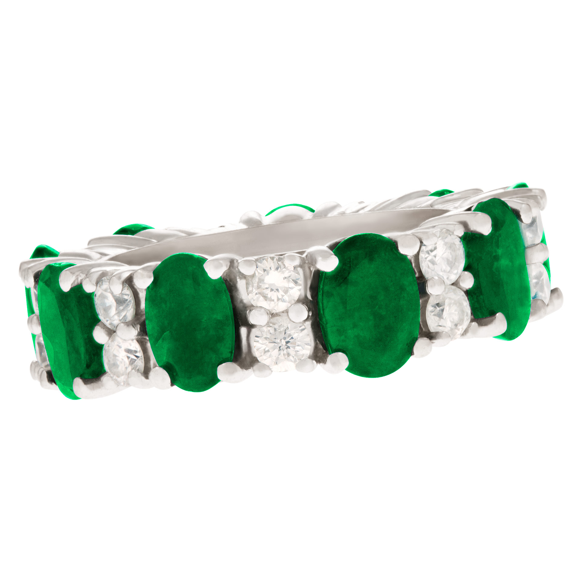 Eternity band in 18k white gold with emeralds & diamonds. Size 4.5