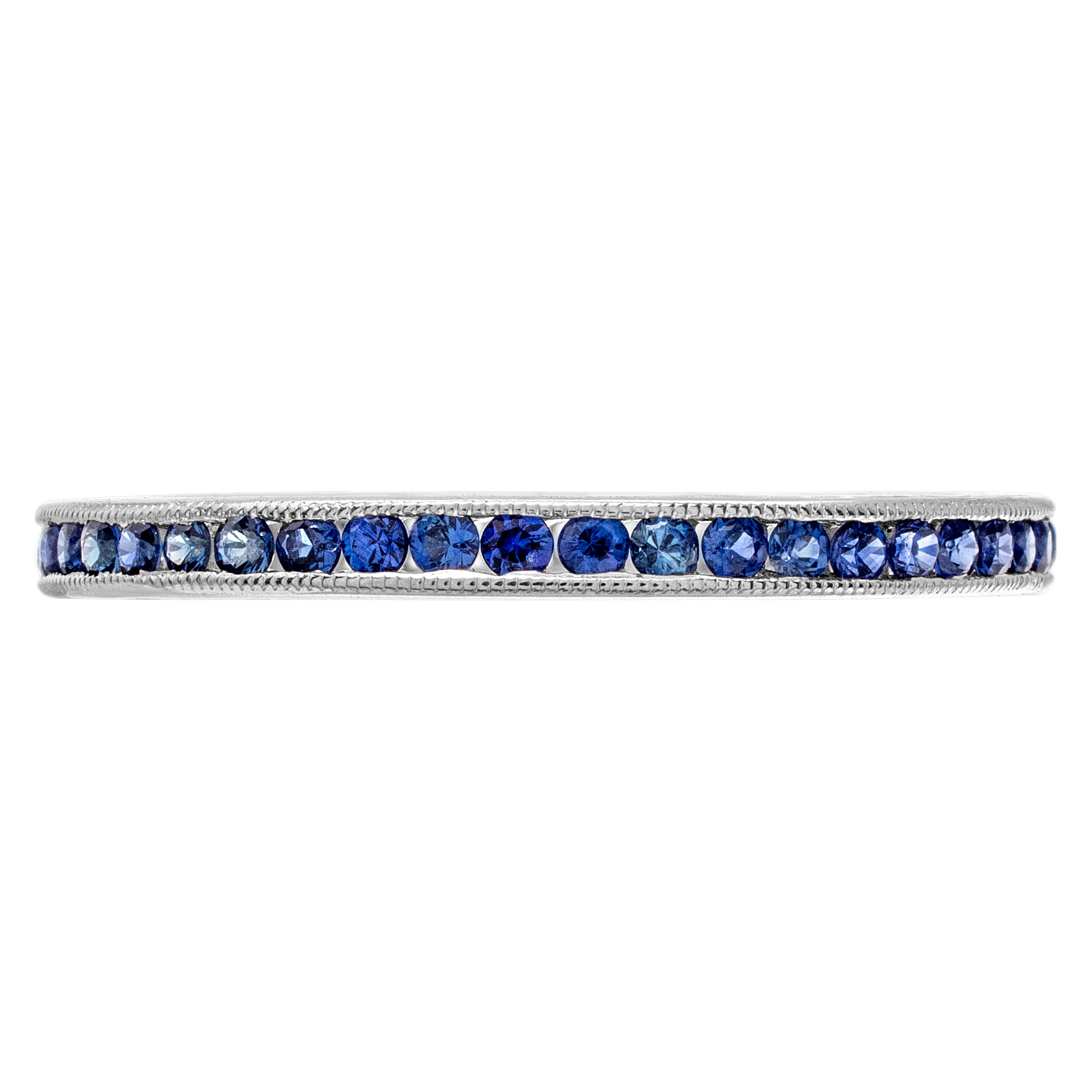 18k white gold eternity band with blue sapphires.