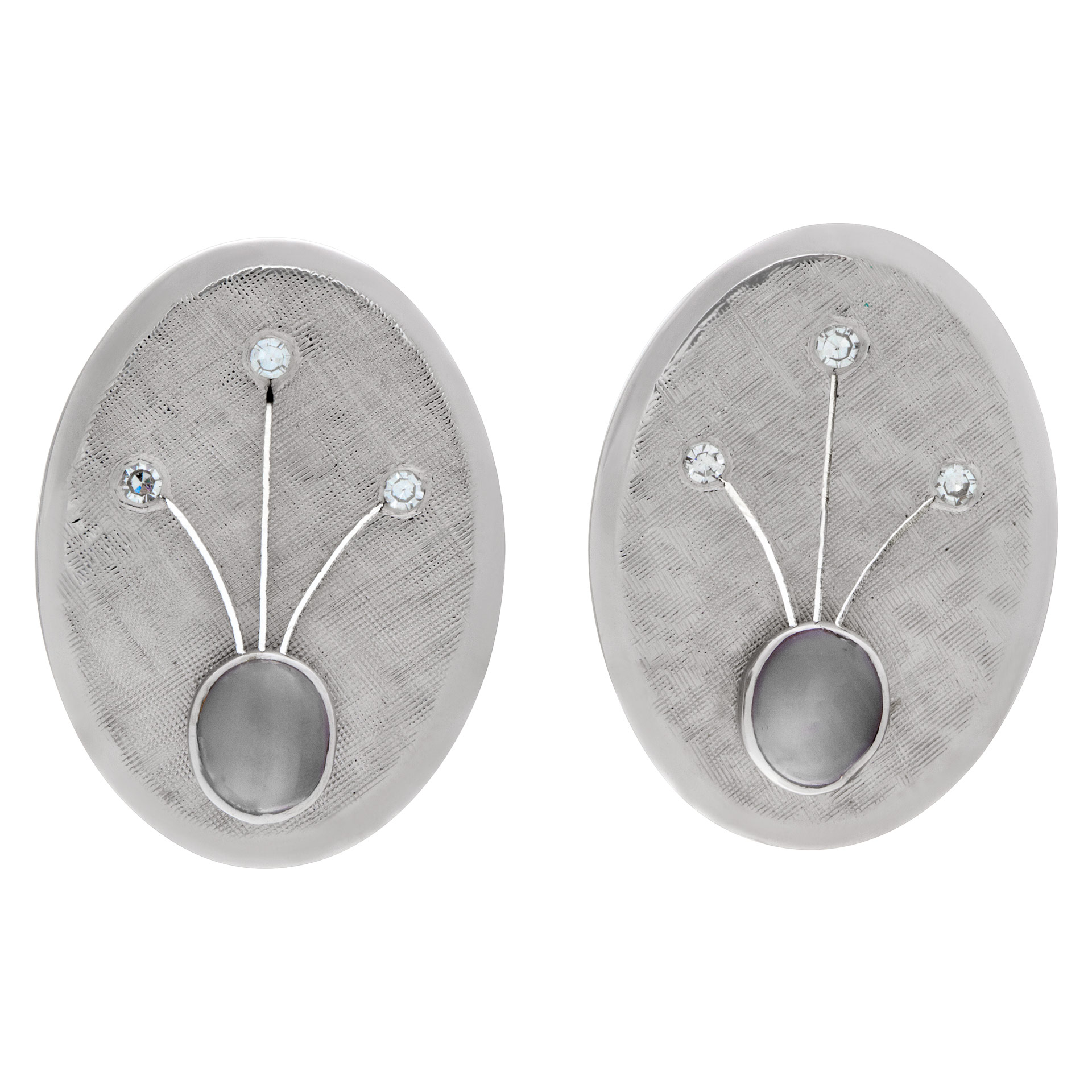 Oval earrings with star sapphire and diamond accents in 14k white gold