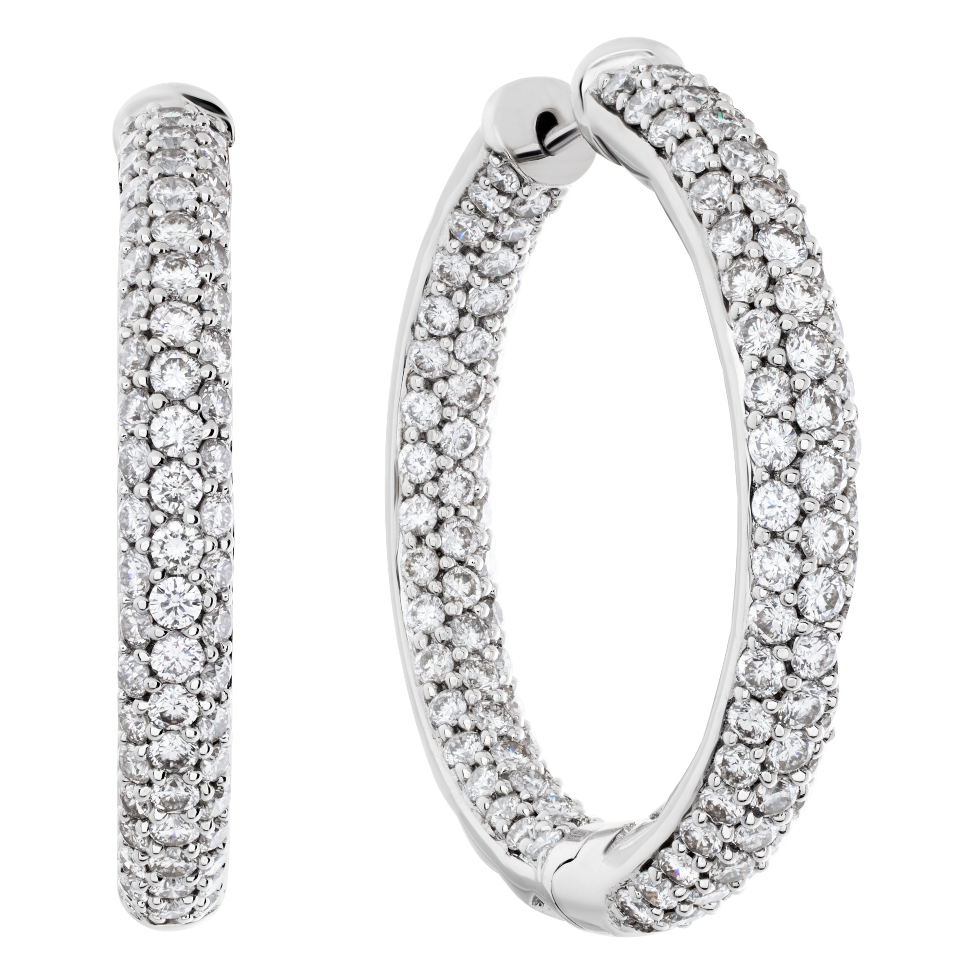 "Inside out" Diamond hoop earrings in 18k white gold.  Round cut brilliant diamonds total approx. weight: 3.50 carats