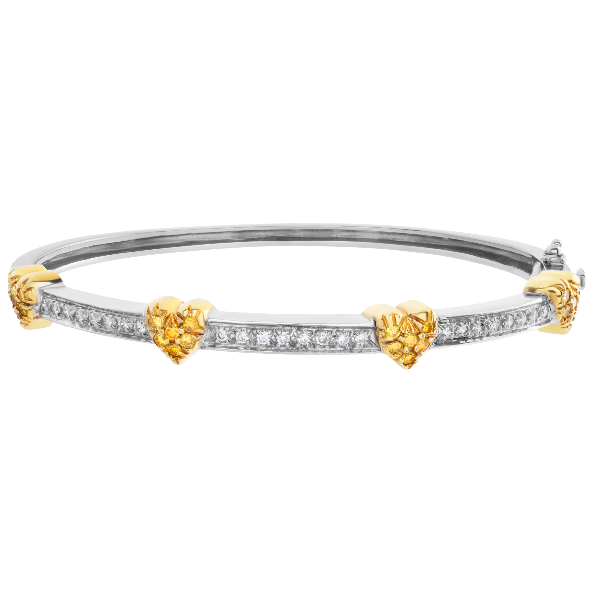 White and yellow diamond heart bangle in platinum and 18k yellow gold. Approximately 0.54 carats in white & yellow diamonds.