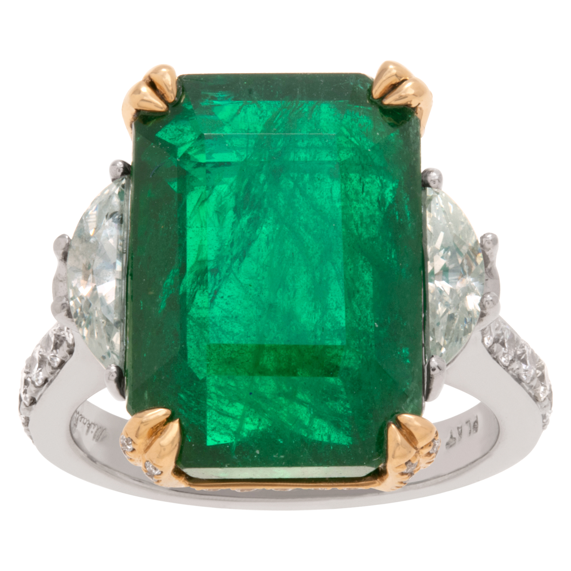 Emerald and diamond ring in platinum and 18k yellow gold
