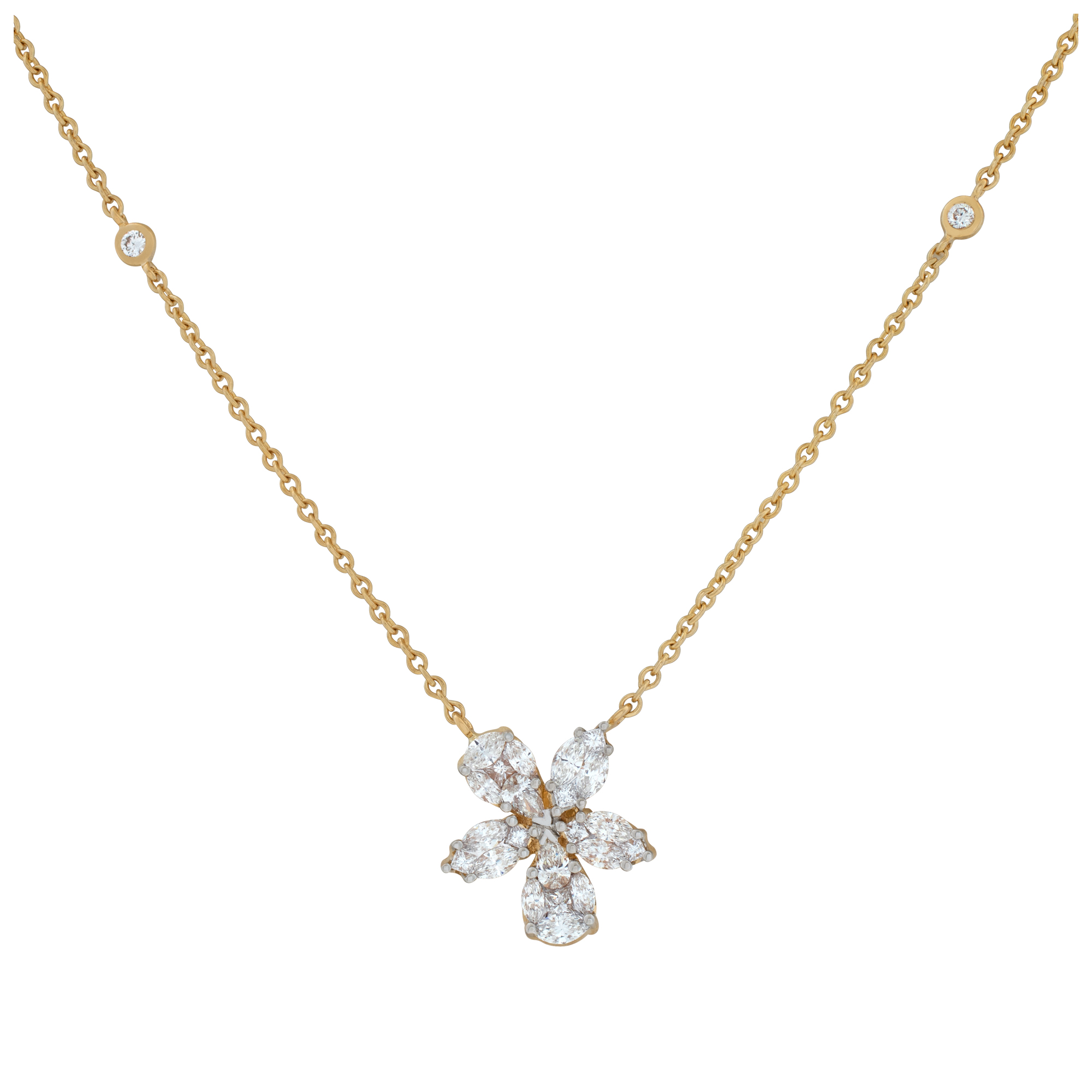 Illusion set diamond flower pendant in 18k yellow gold with 1.14 carat in diamonds. 18 inch length.