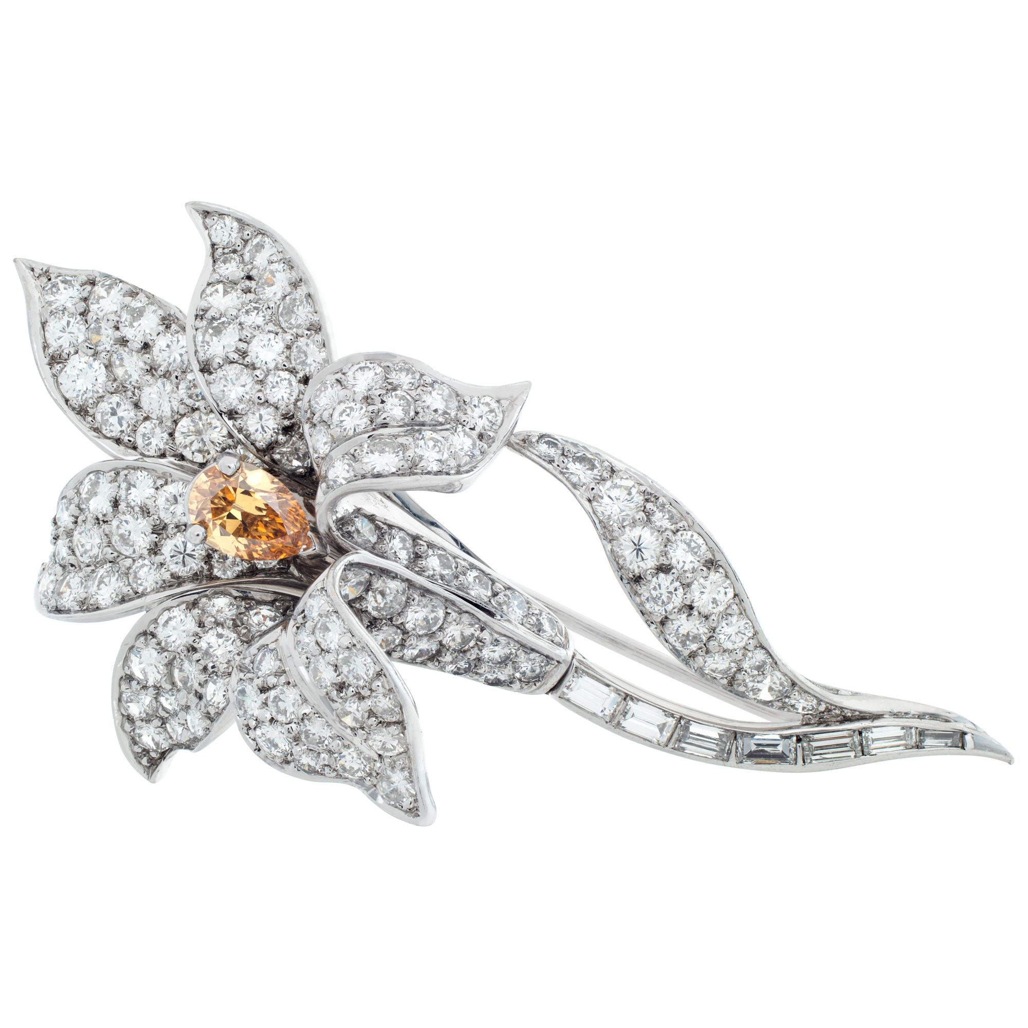 Flower brooch with round brilliant and baguette diamonds set in 18K white gold.