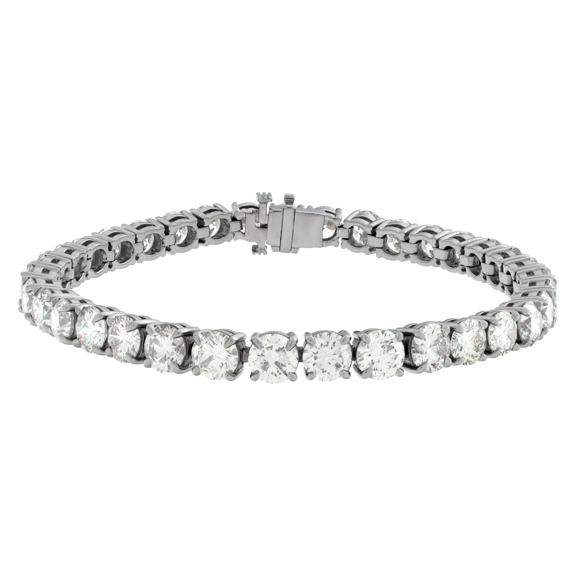 Round brilliant cut diamond line bracelet set in platinum.Approx. 19.76 carats total weight.