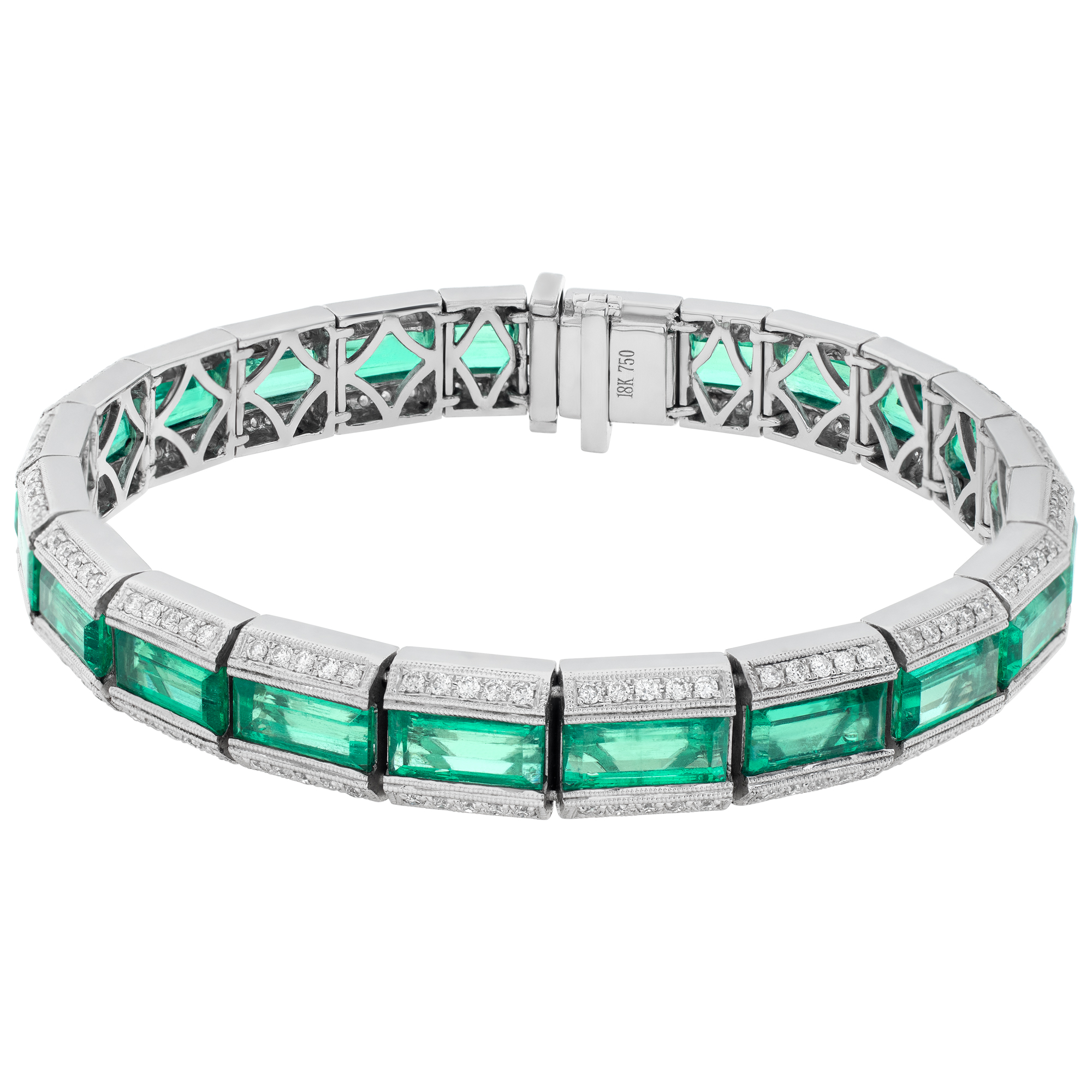 Colombian emerald cut emerald and diamond line bracelet set in 18K white gold.