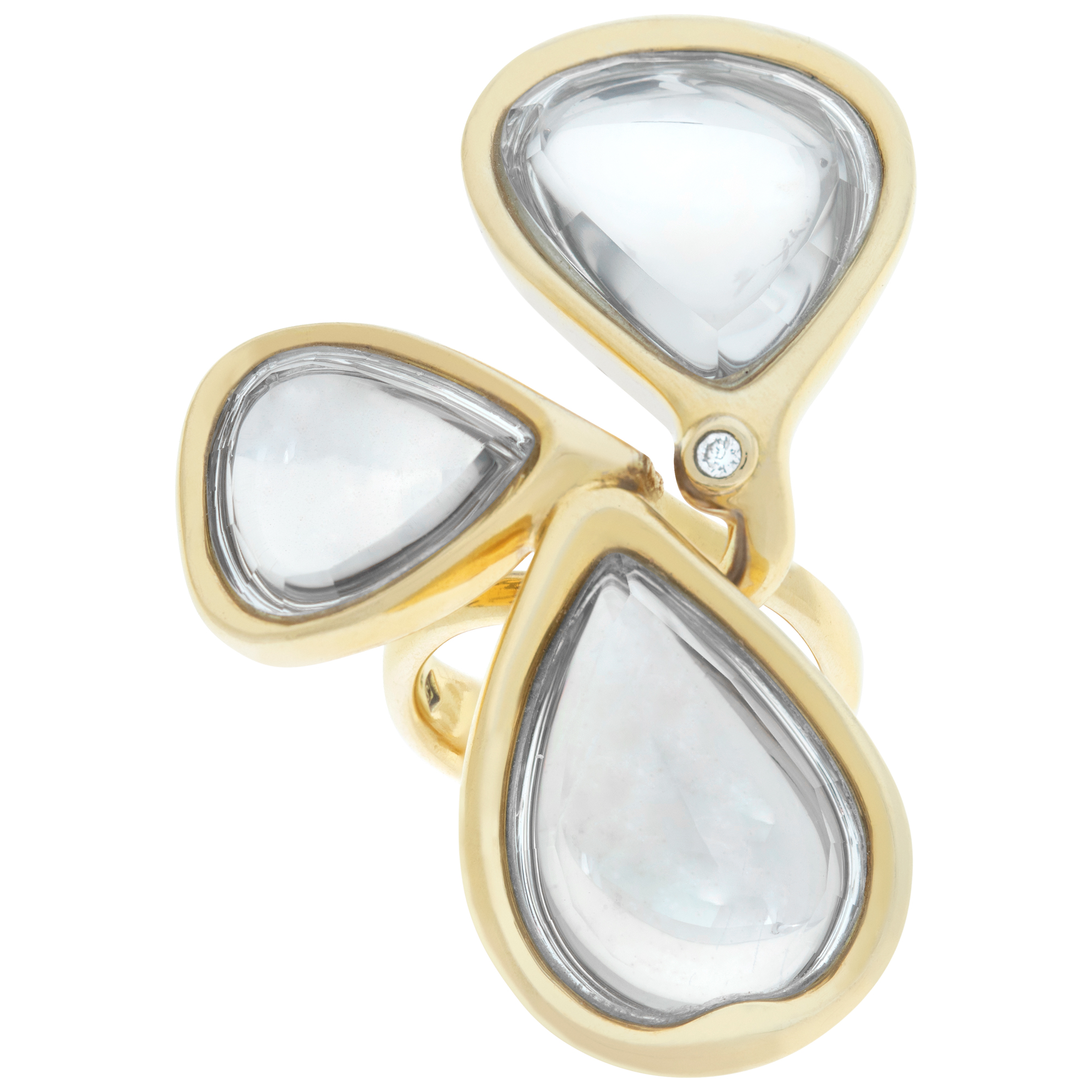 H Stern free form flower ring in 18k with reflective crystal petals and single bezel set diamond in the center.