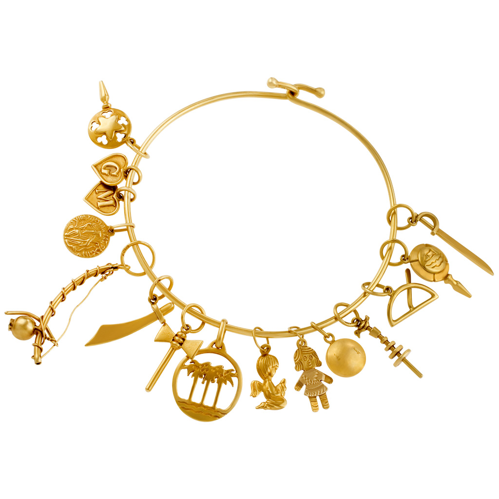 Lovely bracelet in 18k yellow gold with a variey of unique charms. image 1