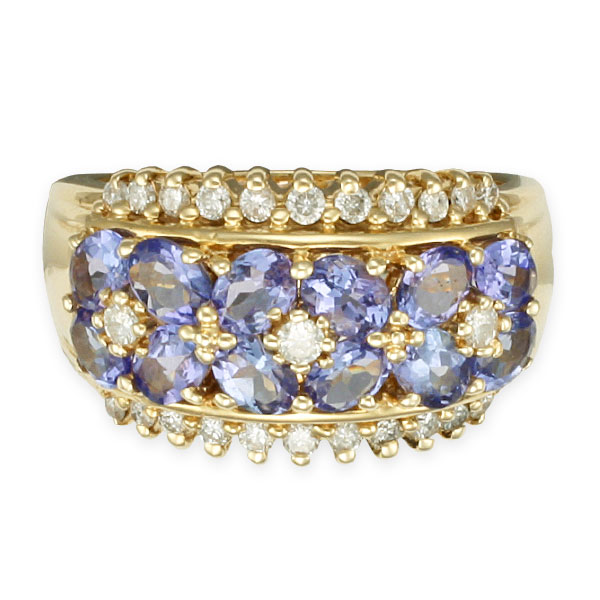Lovely oval tanzanite and diamond ring in 14k. 0.50 carats in diamonds. Size 8 image 1