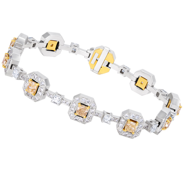 Fancy yellow and  white diamond bracelet in 18k white gold. image 1