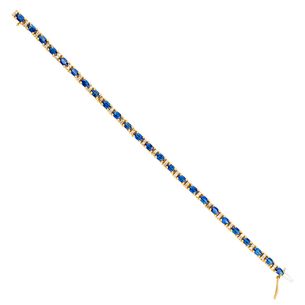 14k bracelet in sapphires and in diamond accents. image 1
