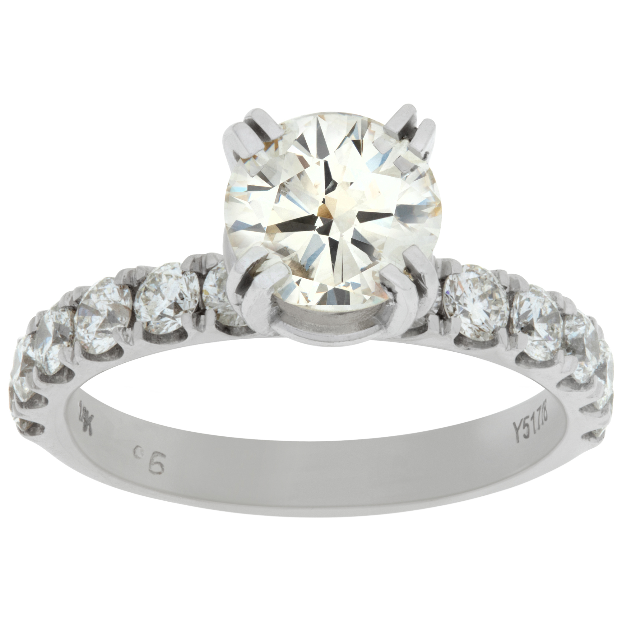 GIA certified round brilliant cut 1.37 carat diamond (O-P range, very light brown, SI clarity) ring set in platinum image 1