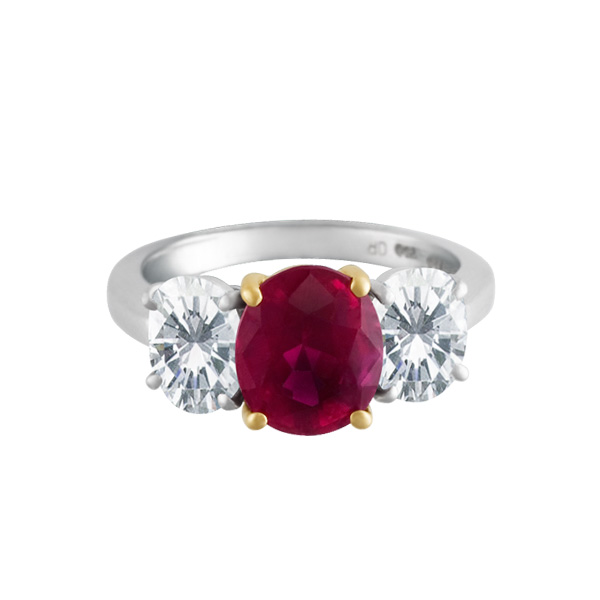 Oval ruby and diamond ring in platinum and 18k. Center 2.35 ct Ruby & 1.40 cts in diamonds