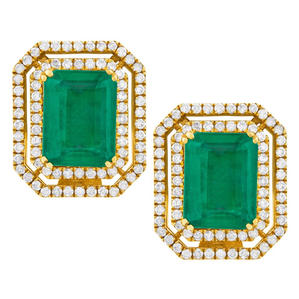 Emerald earrings surrounded by white diamonds in 18k yellow gold. 5.50 cts in emeralds
