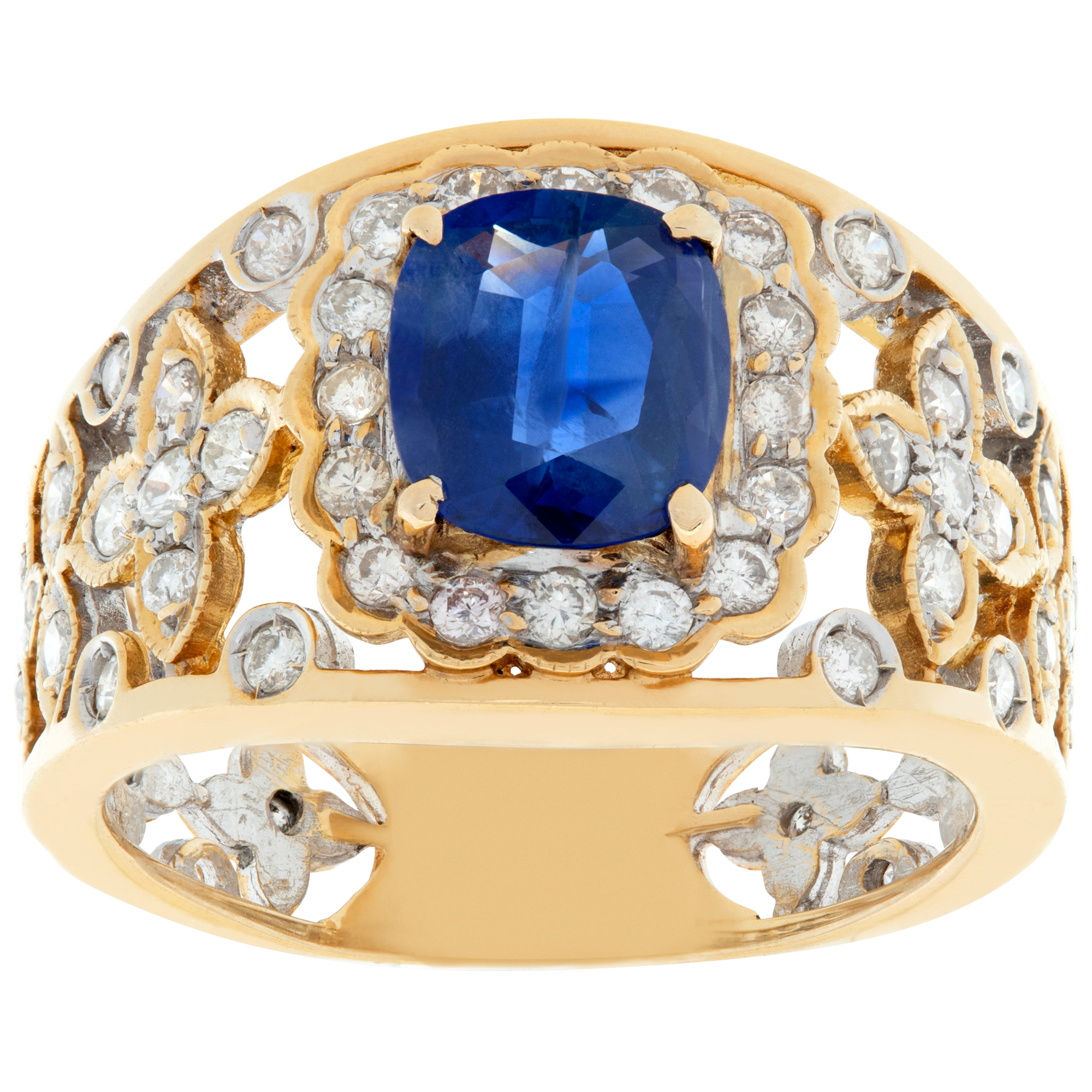 Sweet sapphire flower design ring in 18k with 0.40 cts in diamond accents. Size 7