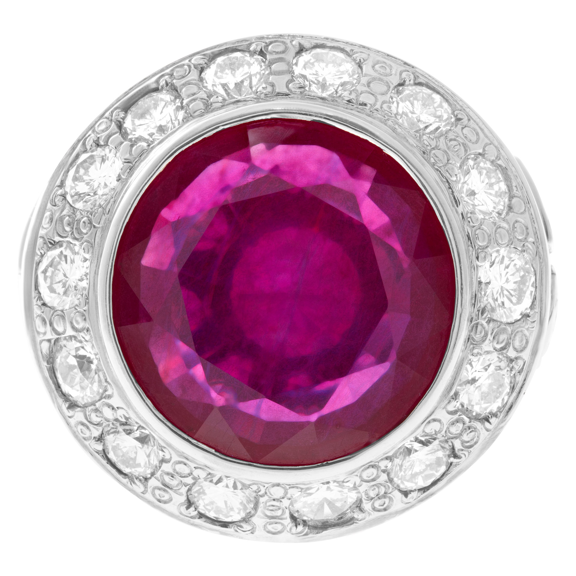 Large and colorful composite filled ruby and diamond ring in 18k white gold surrounded by approximately 5.20 carats round brilliant cut diamonds Composite ruby is approximately 19.20 cts