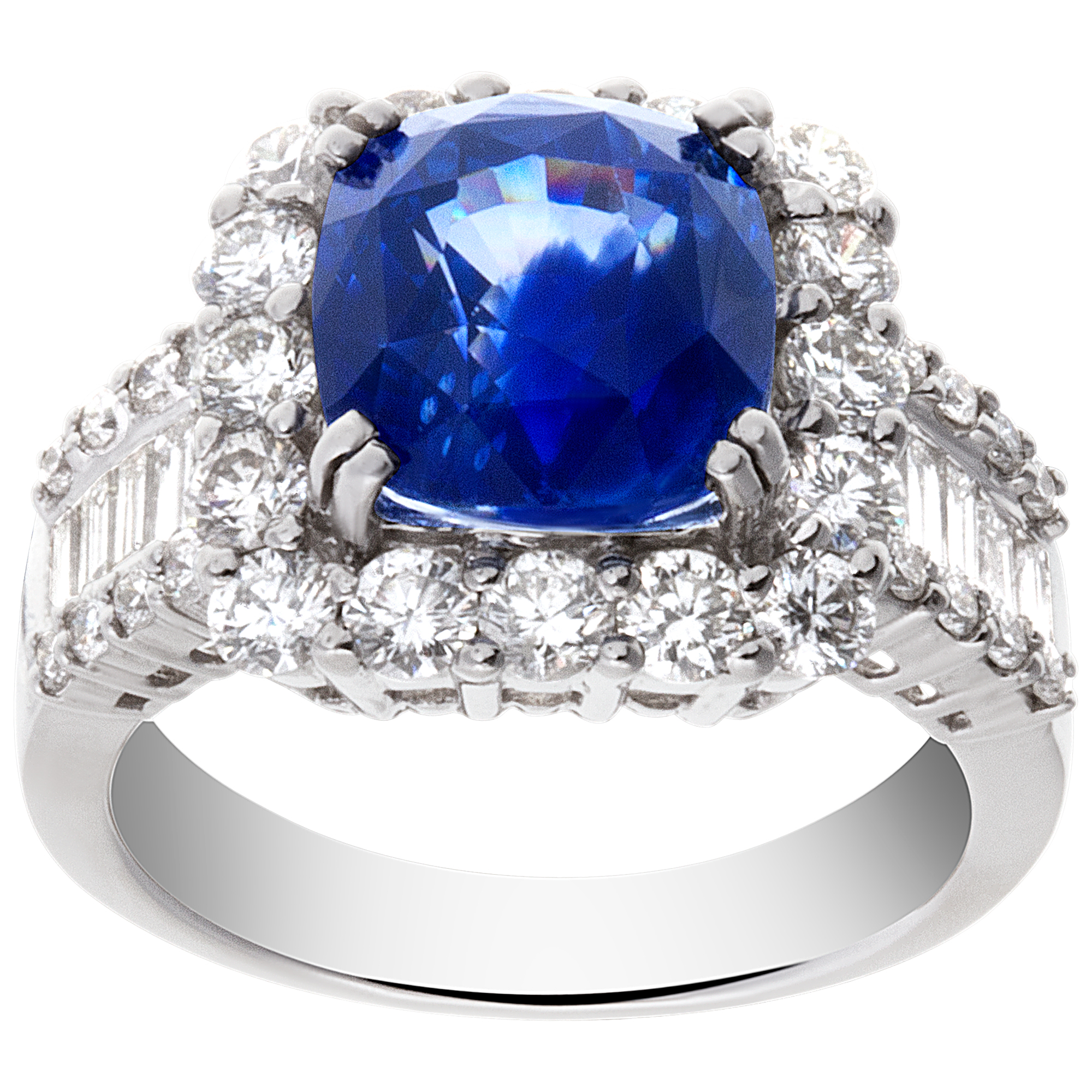 Sparkling 5.73 carat blue sapphire ring with diamond accents in 18k white gold