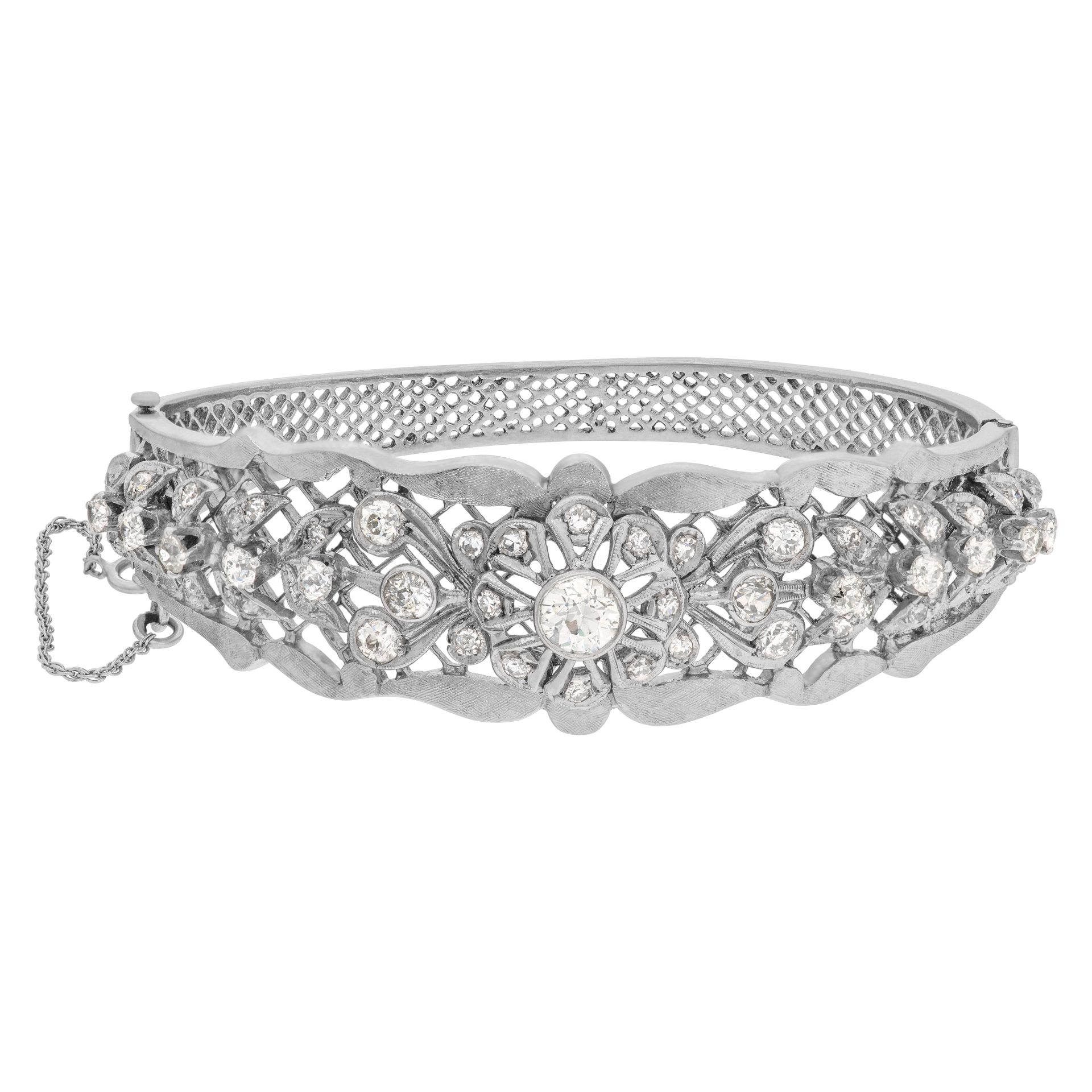 Diamond bangle with approximately .70 carat in center and appr. 2 carats in surrounding diamonds in 14k white gold