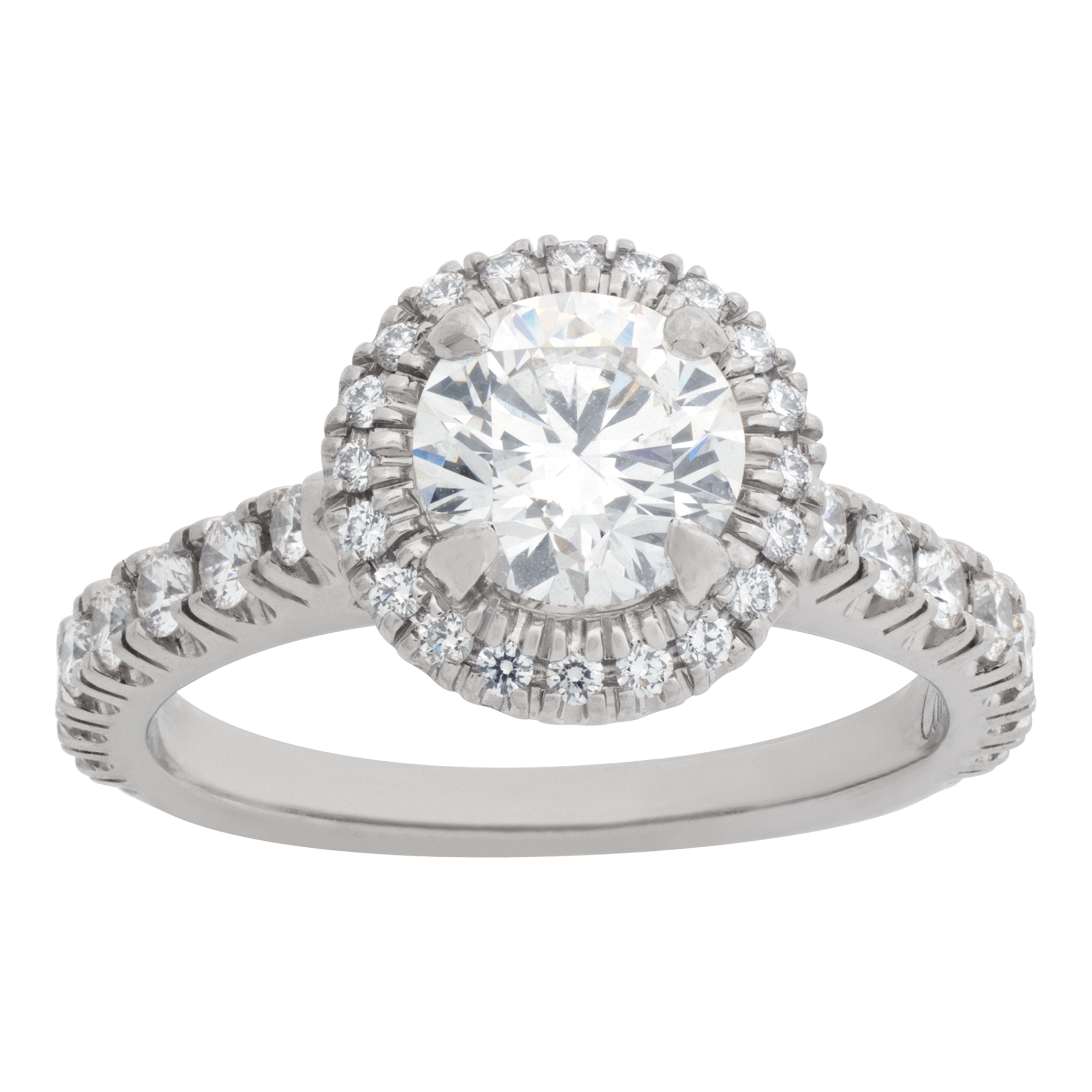 Cartier "Destinee" collection, GIA certified 0.73 caratt full ct round brilliant diamond set in a halo platinum setting.
