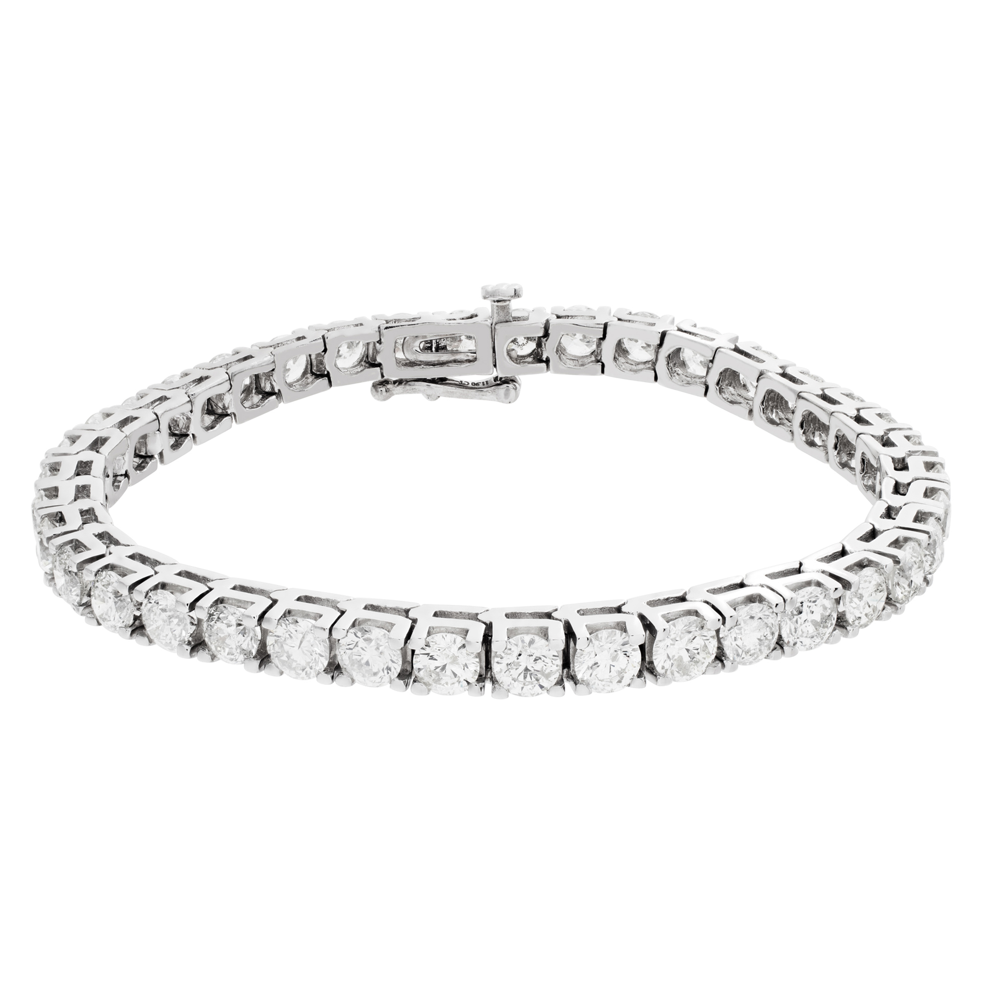 Line diamonds & platinum bracelet with 11.90 carats full cut round brilliant diamonds.