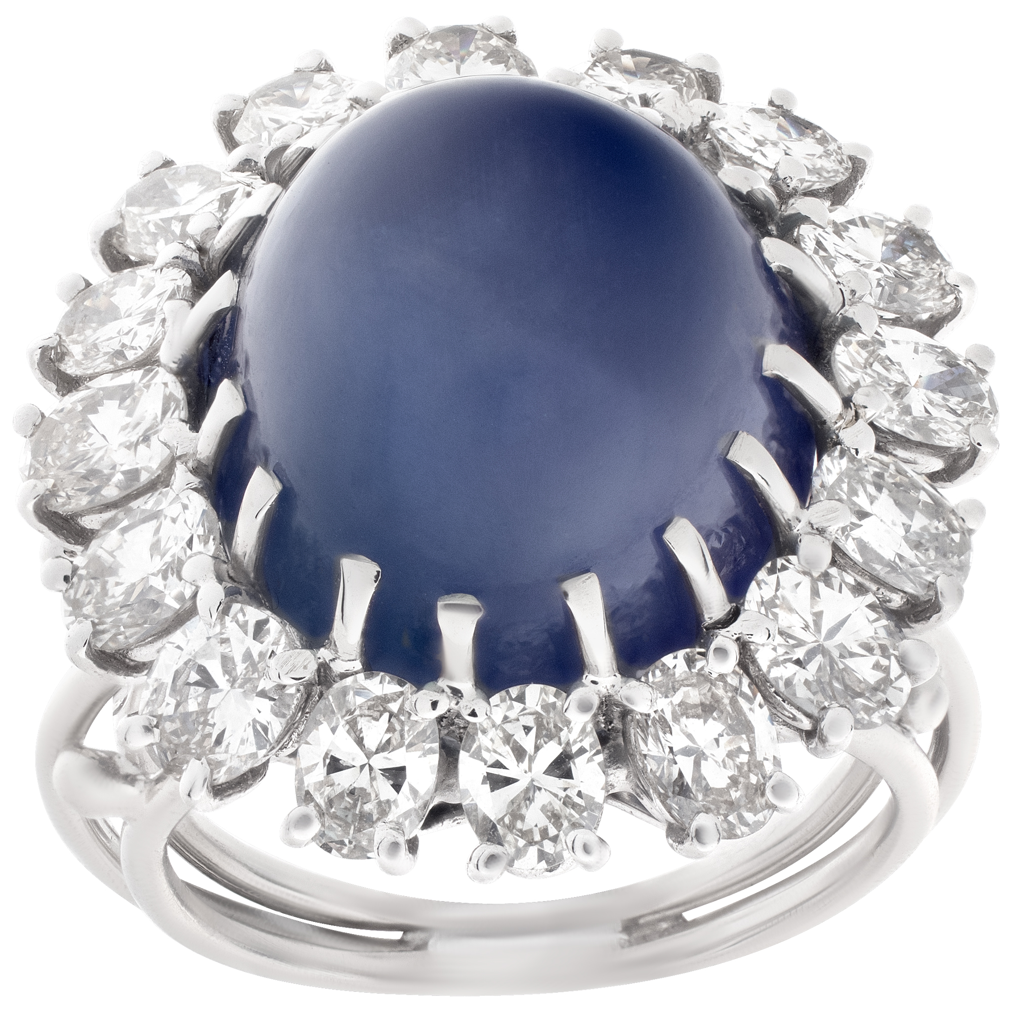 Cabochon star sapphire & oval brilliant diamonds ring set in platinum