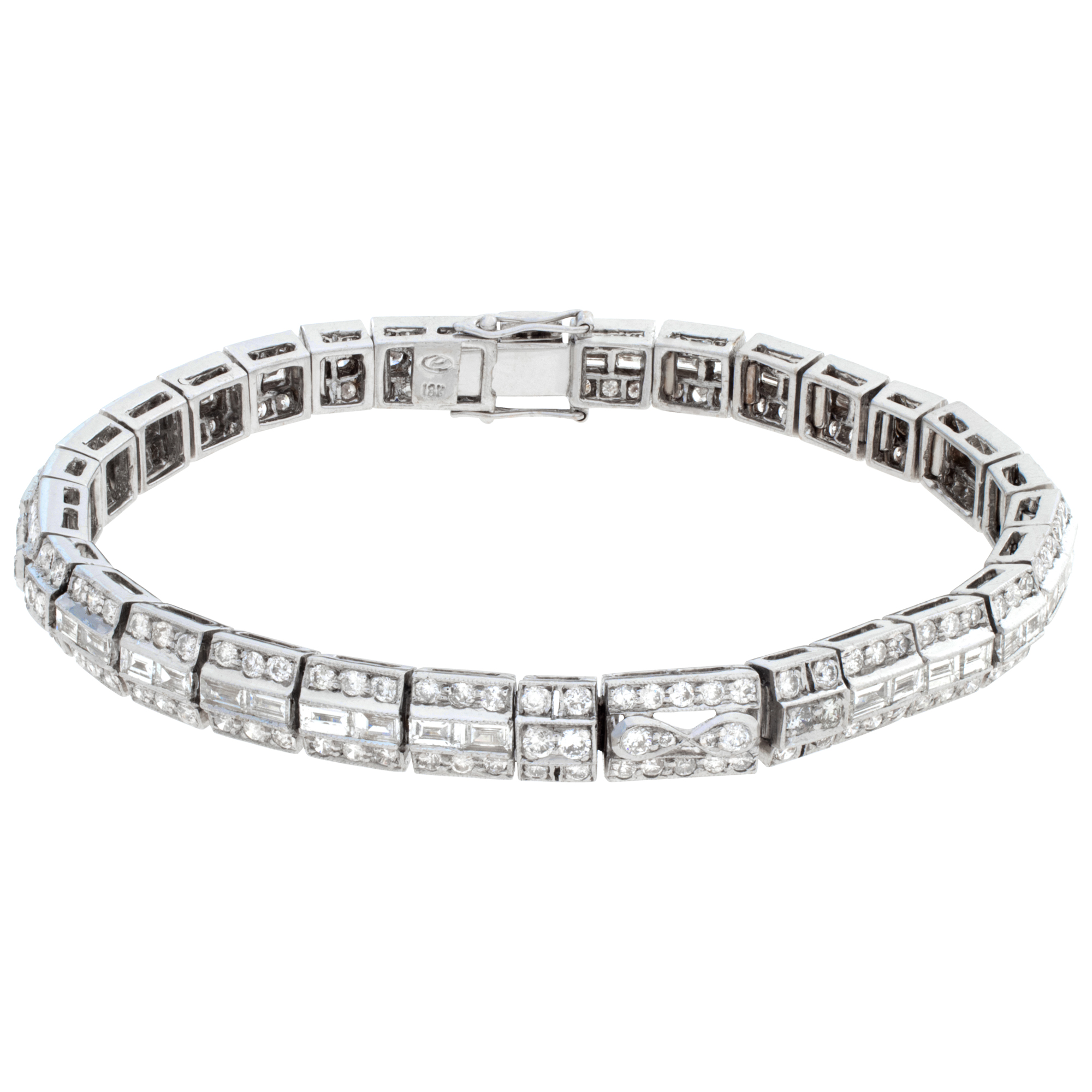 18k white gold diamond line bracele with 4.55 carats in round and emerald cut diamonds
