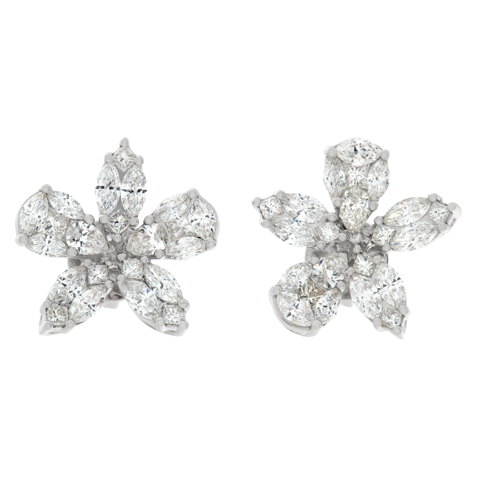 Flower shaped illusion set diamond earrings in 18k white gold
