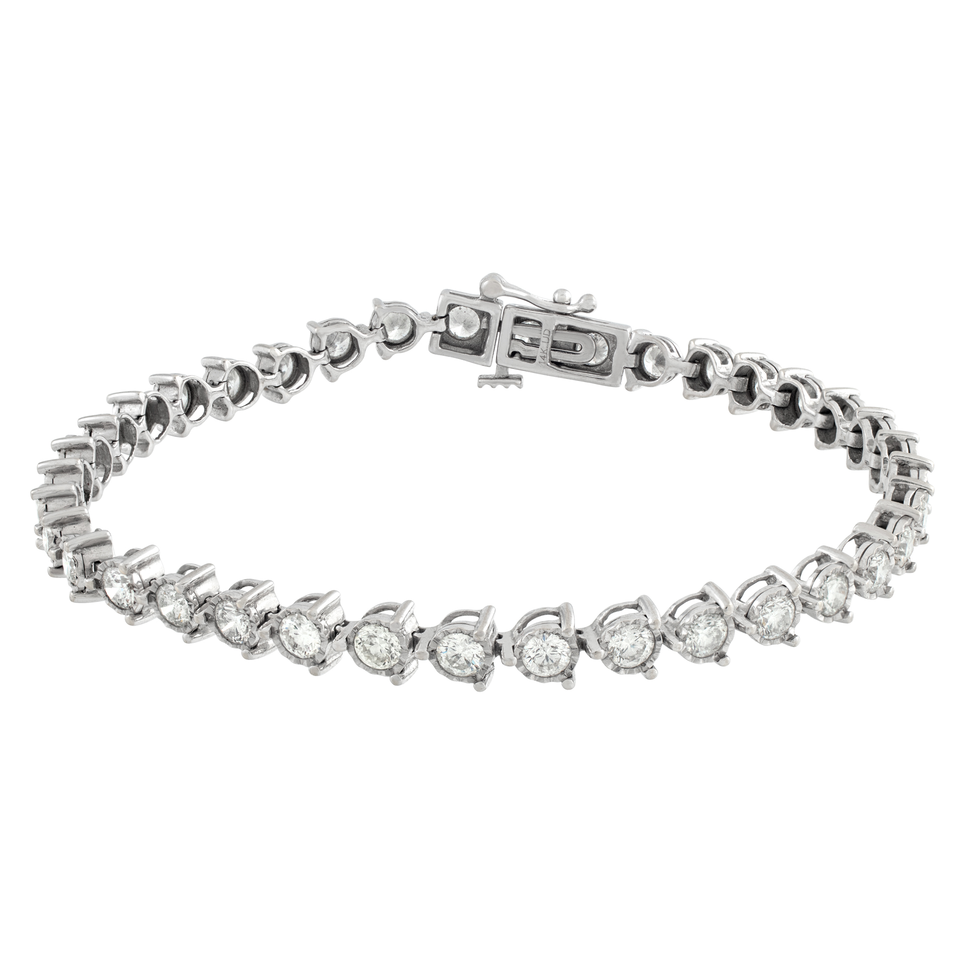 Line diamonds bracelet set in 14K white gold. Round brilliant diamonds total approx. weight: 3.70 carats
