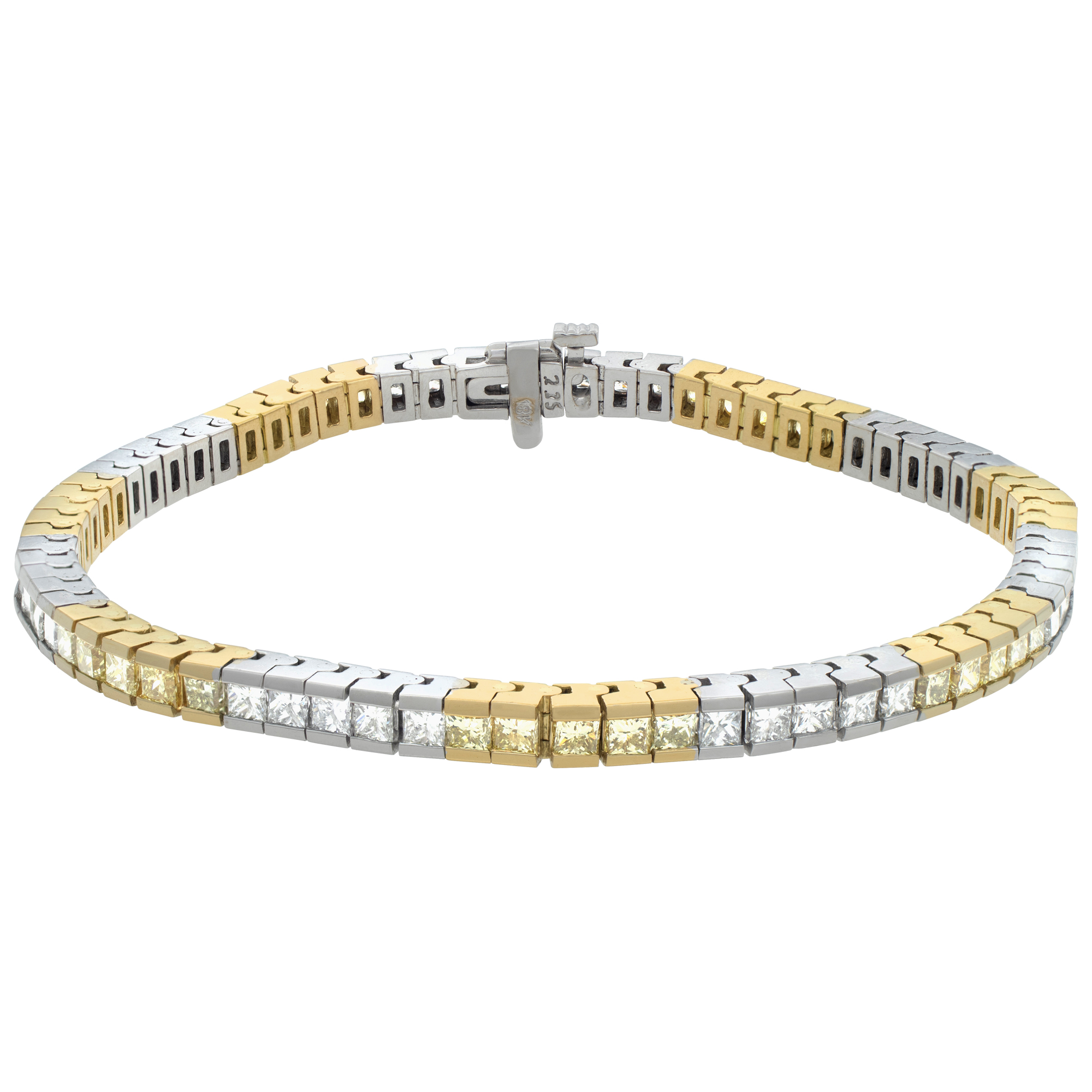 18k white and yelllow gold bracelet with white and yellow diamonds. (Stones)